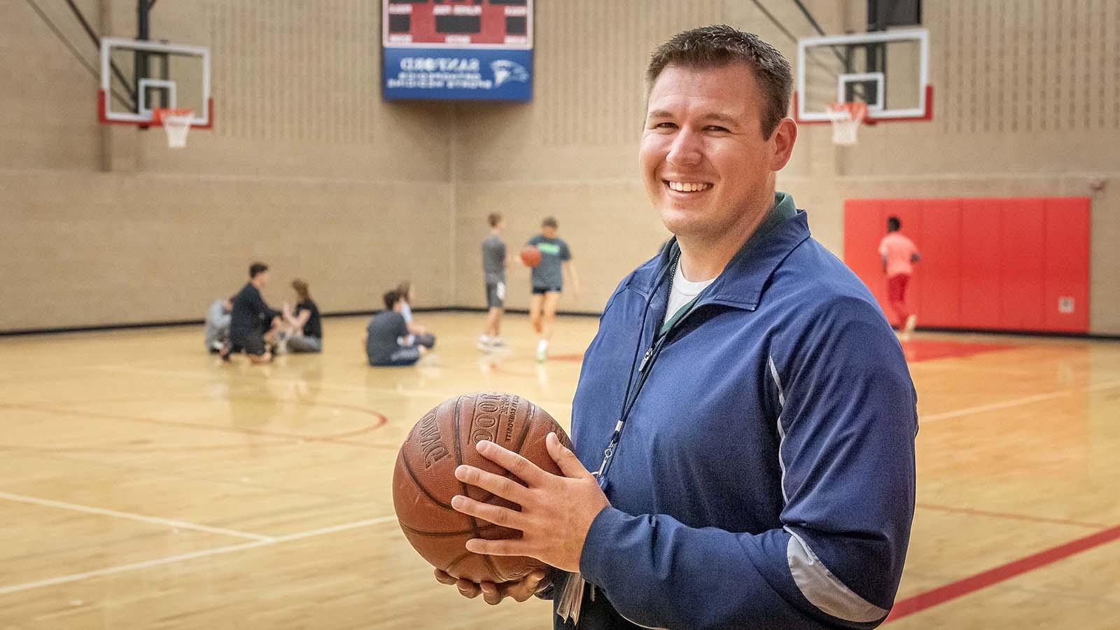 High school coach in basketball practice